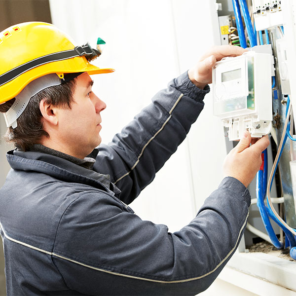 Electrician installing device hardhat
