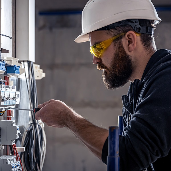 Electrician working on new construction site.