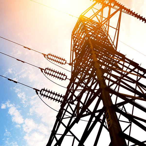 Utility high voltage power lines sunset