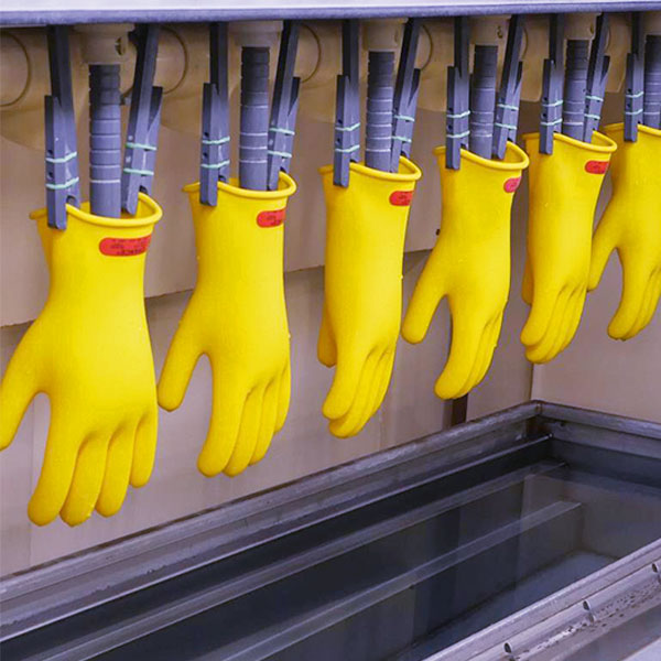 Yellow rubber gloves hanging