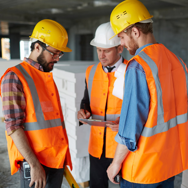 Foreman going over safety measures to prevent accidents.