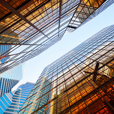 Upward view of class office buildings