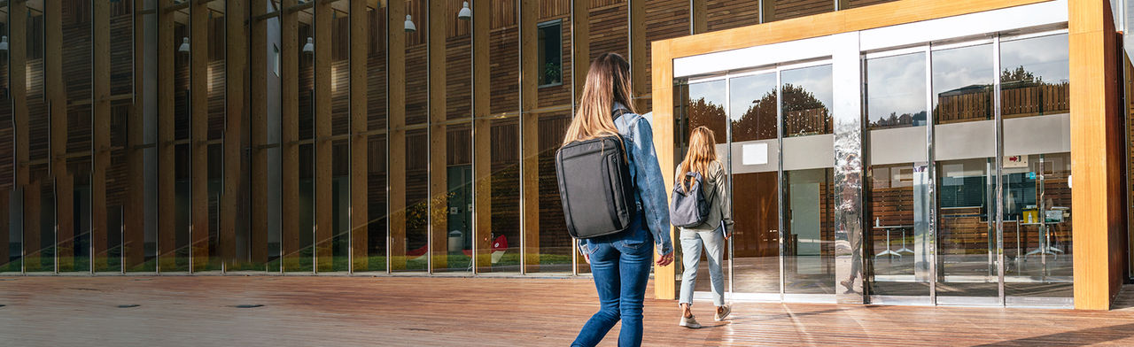 Students walking into building
