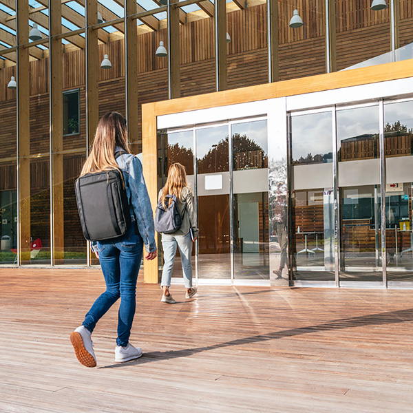 Students walking toward school entrance