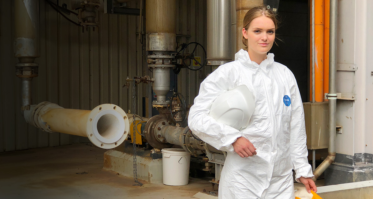 Female industrial worker wearing protective gear