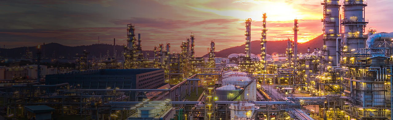Sunset over industrial plant