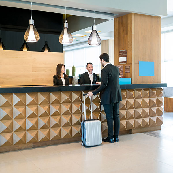 Hospitality hotel desk service with customer.