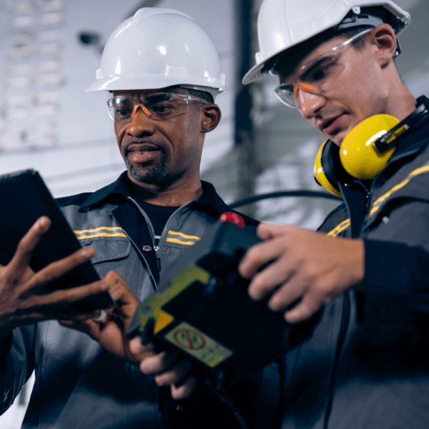 Industrial engineers in manufacturing facility