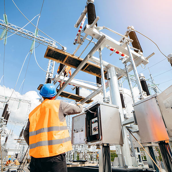 Engineer at distribution site control panel