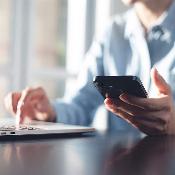 Business person using cell phone