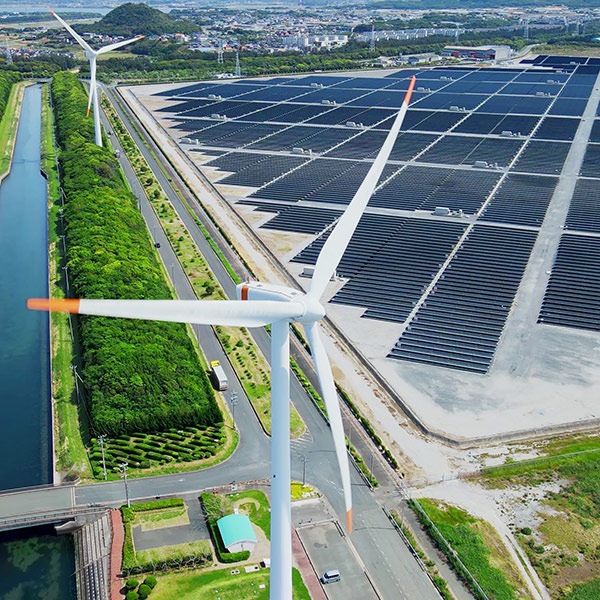 Renewable energy windmill and solar panel field.