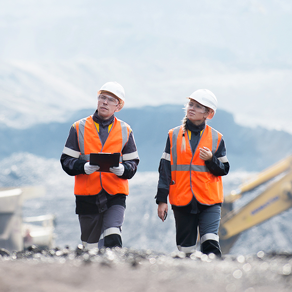 Workers inspecting mine site