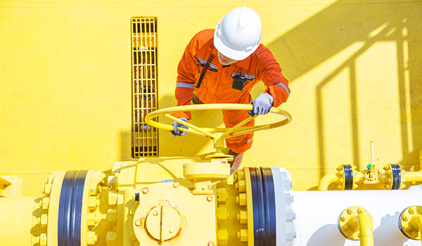 Engineer on oil rig aerial
