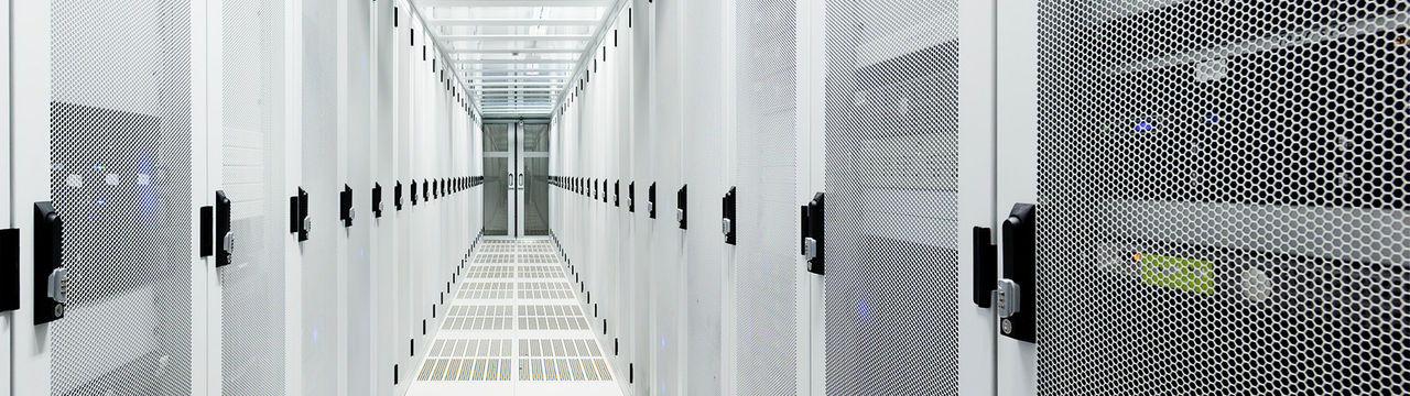 Data center containment aisle with white cabinets