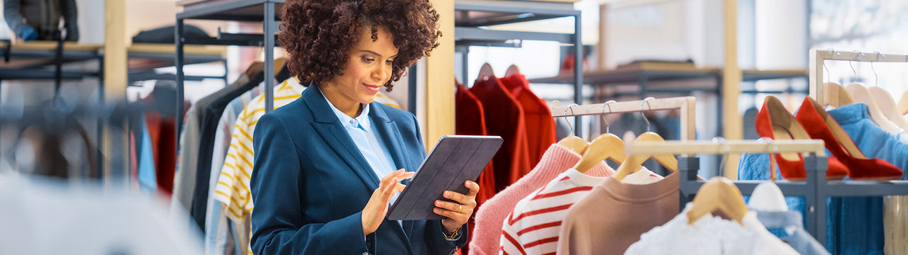 Retail worker using tablet