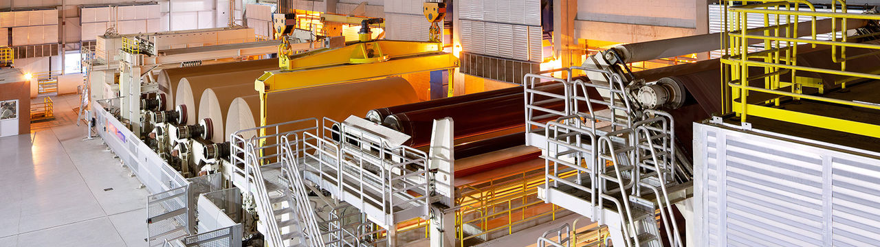 Paper production in factory aerial