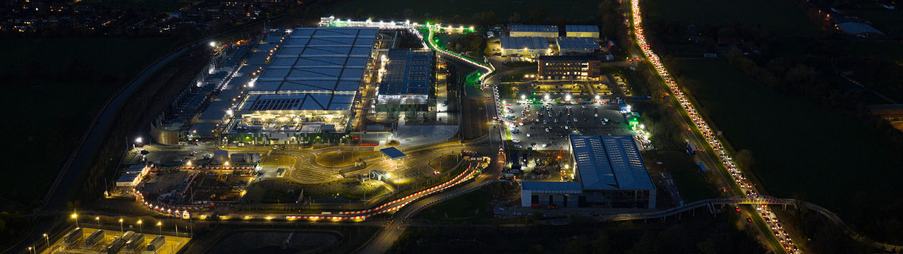 Data center under construction at night aerial view