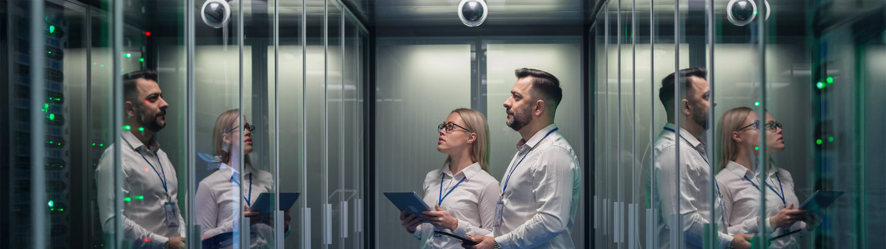 Data center managers with tablet