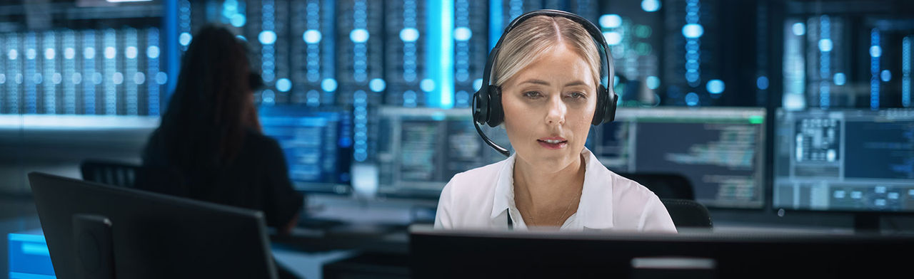 Customer service operator working on control board.