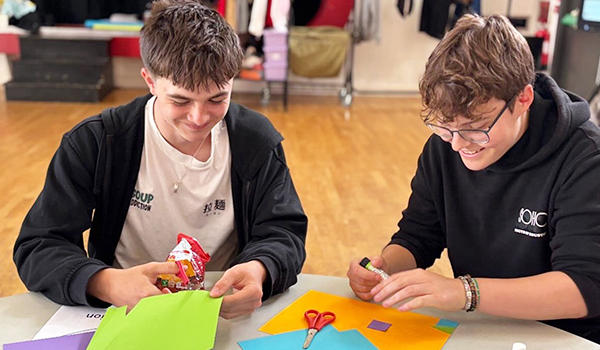 Students working on art piece for Junction Arts