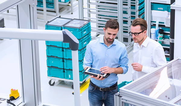 Operations managers in an automation warehouse.