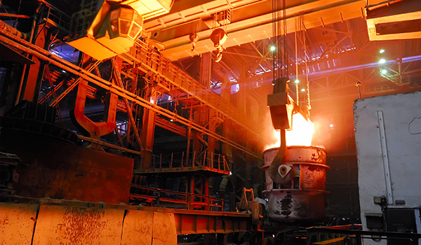 steel works, crane with stove busket