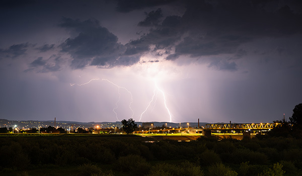 Multiple lightning during thunderstorm at night.