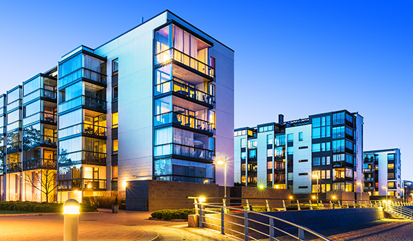 Modern real estate buildings at night.
