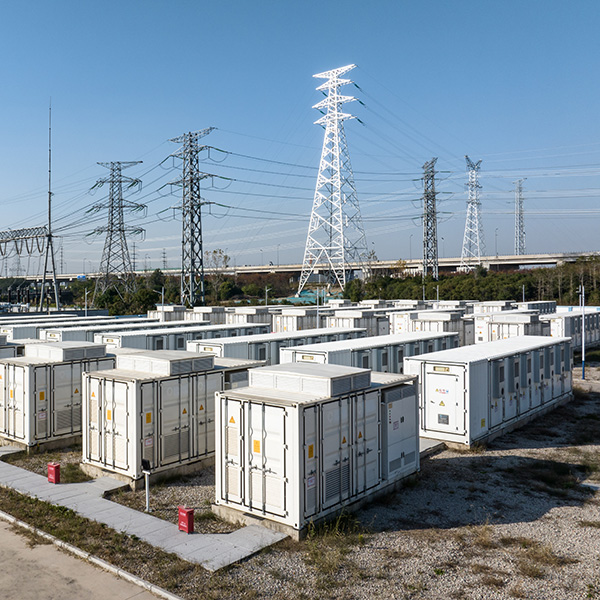 Battery storage units by utility lines.